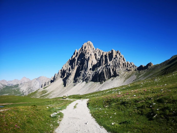gray mountain range under blue sky during daytime